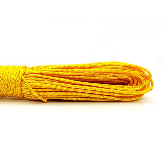 A coil of bright yellow 2mm multi-color paracord rope.