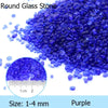 A pile of small purple round glass stones, measuring 1-4 mm in size.