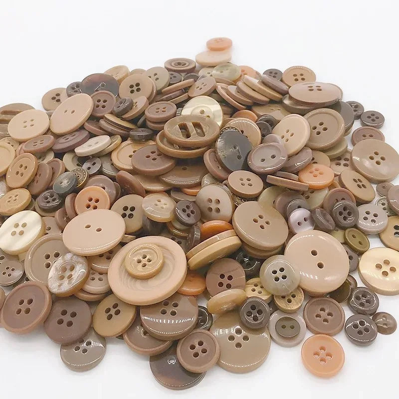 Assortment of natural wood buttons in various shades and sizes for sewing and crafts