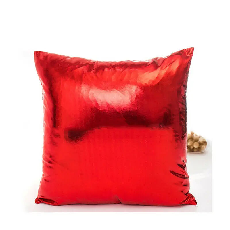 A square red metallic shine decorative pillow with a slightly wrinkled texture.