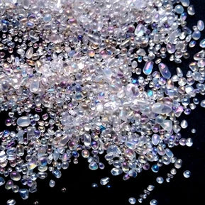A close-up view of clear and iridescent decorative stone pebbles for terrariums and aquariums