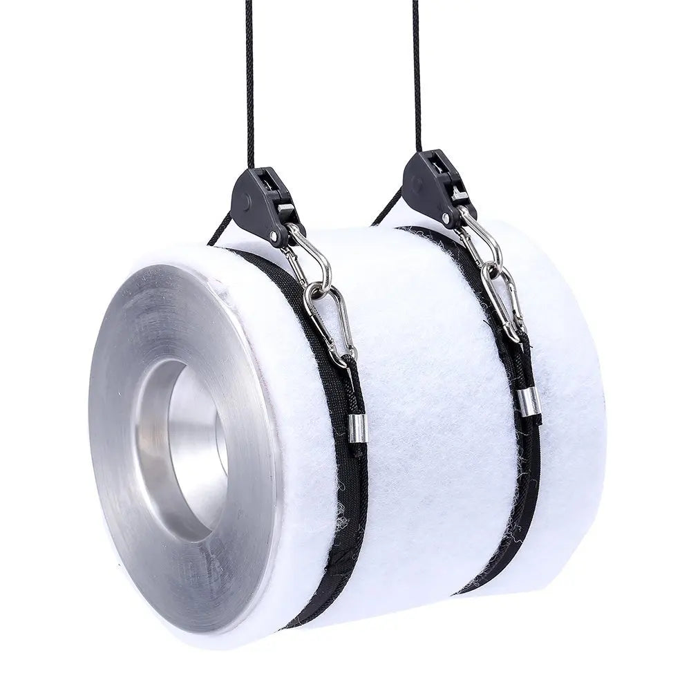 A spool of white foam or batting with black rope clips attached for hanging