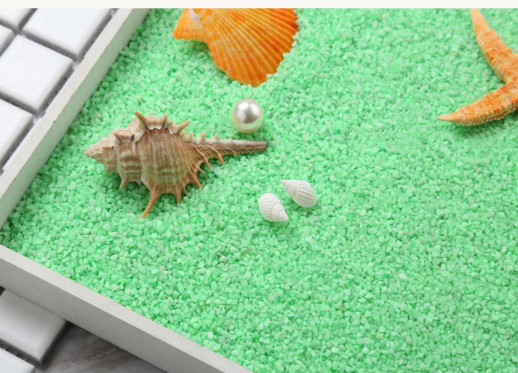 Decorative stone pebbles for terrariums and aquariums featuring various seashells and stones.