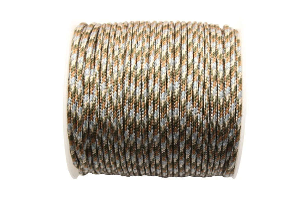 A spool of high-visibility reflective paracord in shades of brown, gray, and blue.