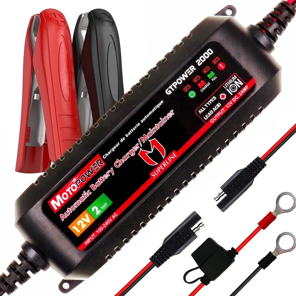 A black 12V motorcycle battery charger and maintainer with red and black accessories.