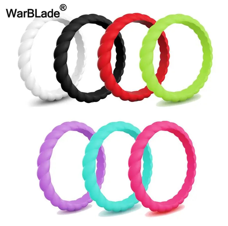 A collection of braided silicone rings in various colors including black, white, red, and lime green.