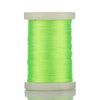 A spool of bright lime green braided polyester thread for guide tying and repairs.