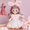 A pink-haired fashion doll wearing a white lace dress and a pink bow, with a red checkered outfit hanging nearby.
