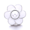 A white flower-shaped metal snap button with a central pearl detail for jewelry making.