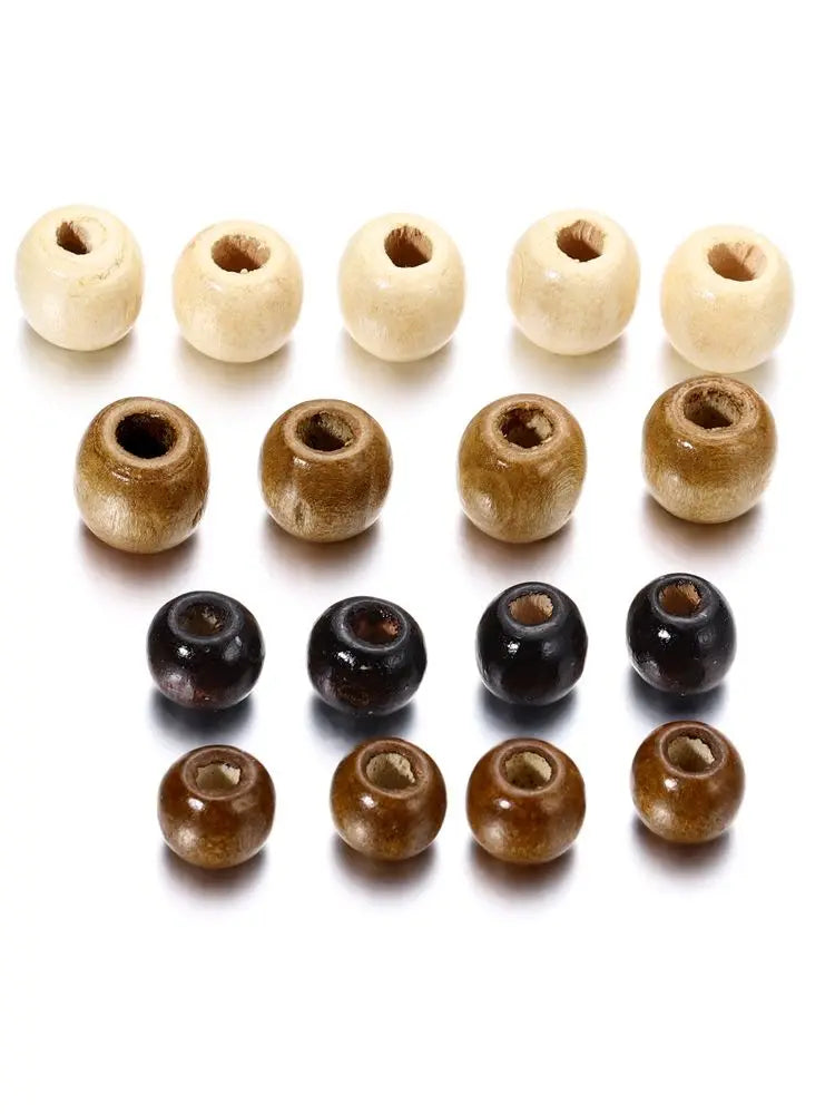 A collection of natural wooden spacer beads in various light and dark shades arranged in a row.