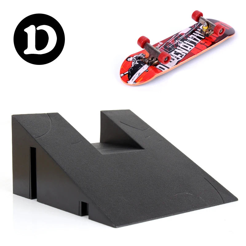 A finger skateboard featuring a red deck and black graphics, shown next to a black park ramp.
