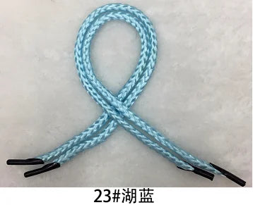 A blue braided string rope with a knot pattern is shown against a white background.