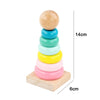 A stack of five colorful wooden rings on a light wooden base for Montessori puzzles.