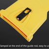 Yellow portable chainsaw sharpener with a black handle clamped at the end of the guide rod