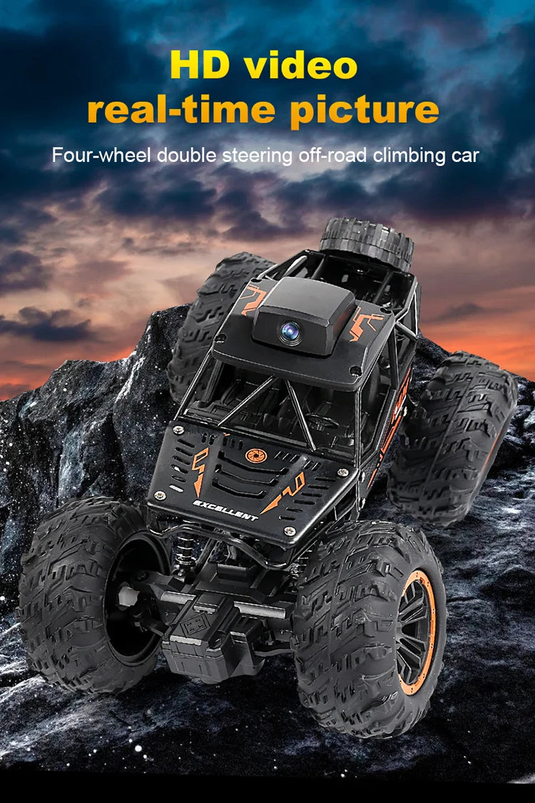 Black four-wheel double steering off-road climbing RC car with HD video camera on a rocky terrain.