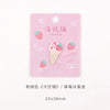 Pink iron-on patch featuring an embroidered strawberry ice cream design.