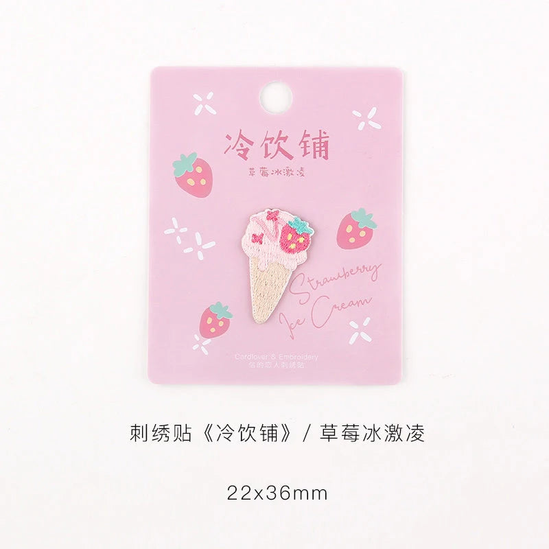 Pink iron-on patch featuring an embroidered strawberry ice cream design.