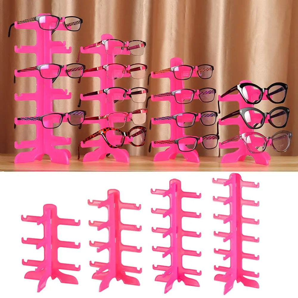 Pink stackable display stand for holding sunglasses and reading glasses