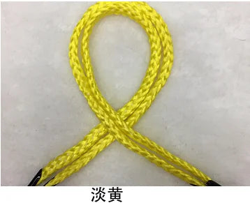 A yellow gift string rope tied in an 'X' shape.