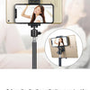 A gold-colored adjustable aluminum tripod stand holding a smartphone, demonstrating its wide application range.