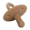 A beige silicone baby pacifier soother with a rounded, ergonomic design.