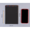 A black notebook with a rainbow scratch art paper set and a smartphone displayed next to it.