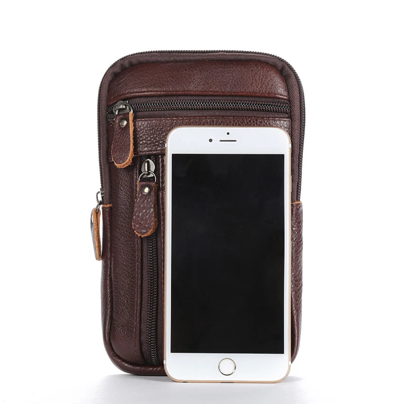 A dark brown vintage leather multi-pocket waist bag holding an iPhone.