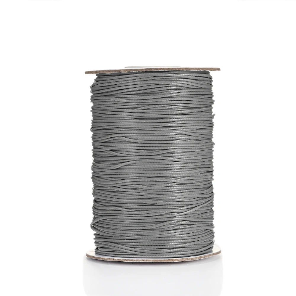 Spool of gray waxed cotton cord for jewelry making