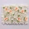 A wall panel of white and blush pink silk rose flowers for weddings and events