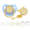 A sparkling rhinestone pacifier with a clip and a gold chain is shown against a white background.