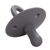 A gray silicone baby pacifier soother with a rounded handle and a smooth body.