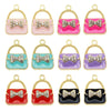 A set of six crystal enamel handbag charm pendants in various colors including pink, green, purple, and red.