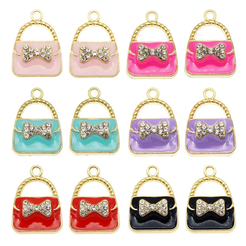 A set of six crystal enamel handbag charm pendants in various colors including pink, green, purple, and red.
