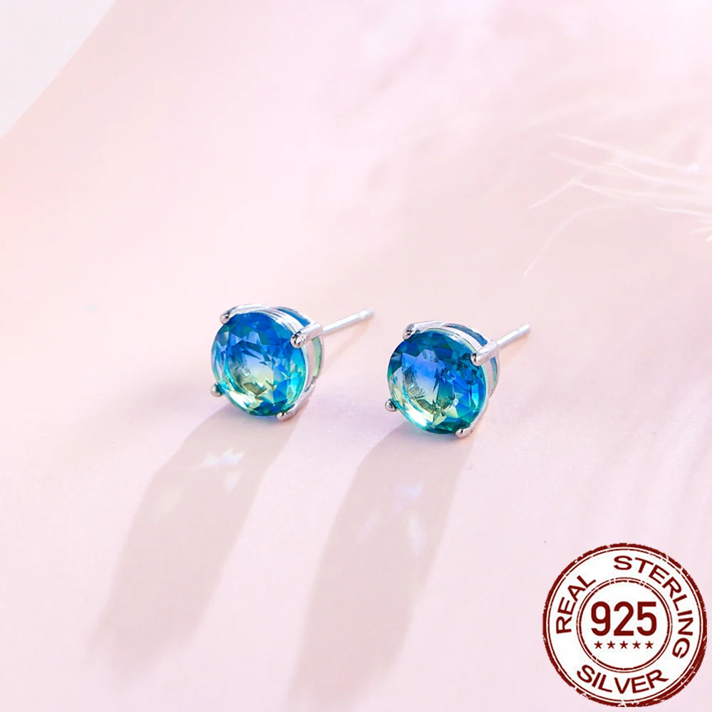 Pair of bright blue gemstone stud earrings set in sterling silver