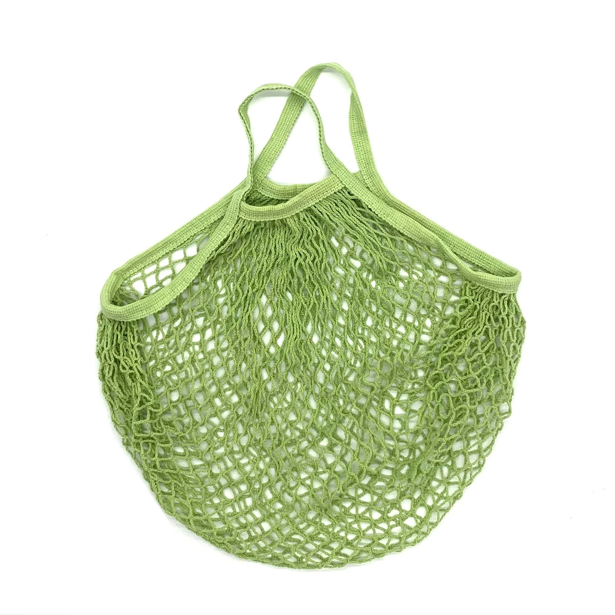 A pair of light green organic cotton mesh produce bags with handles, shown from above.