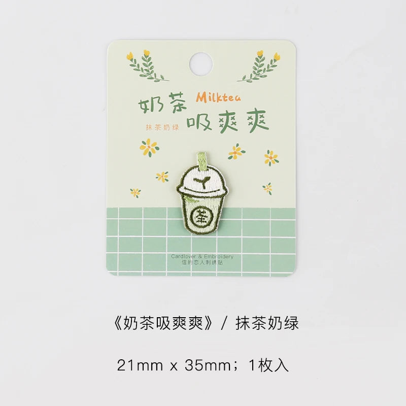 A light green embroidered iron-on patch featuring a stylized cup design and Chinese text.