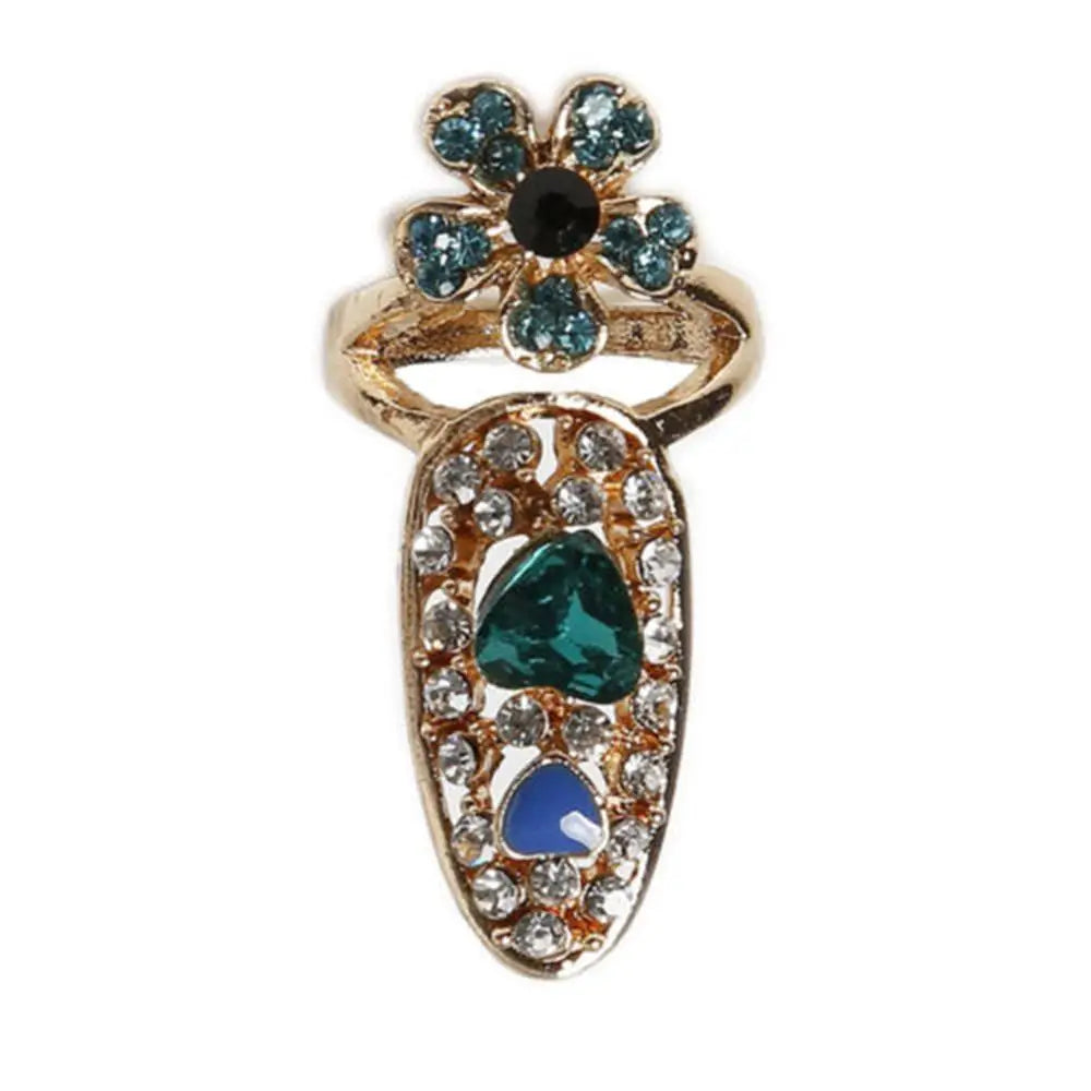 Bague à nœud de couronne en cristal or avec des gemmes bleues et noires