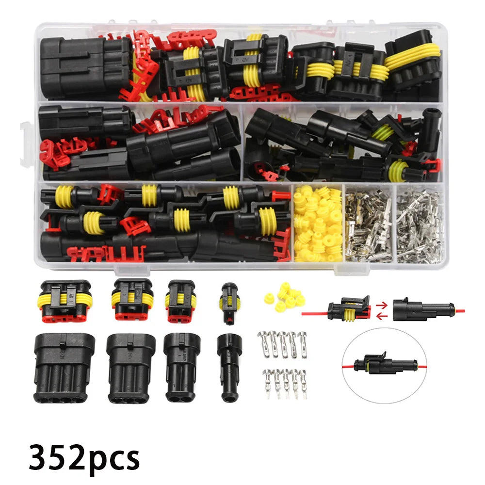 A plastic kit containing various black and red electrical connectors, including male and female terminals, and yellow compone