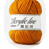 A ball of orange acrylic yarn labeled 06姜黃 (Turmeric) for knitting and crochet.