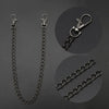 A silver chrome steel punk chain necklace and a keyring are displayed against a dark background.