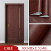 Close-up view of dark reddish wood grain self-adhesive wallpaper for doors and furniture, showing texture and application.