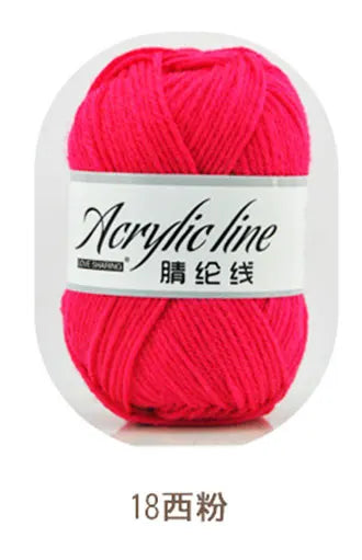 A ball of bright pink acrylic line yarn labeled as 18 ply for knitting and crochet.