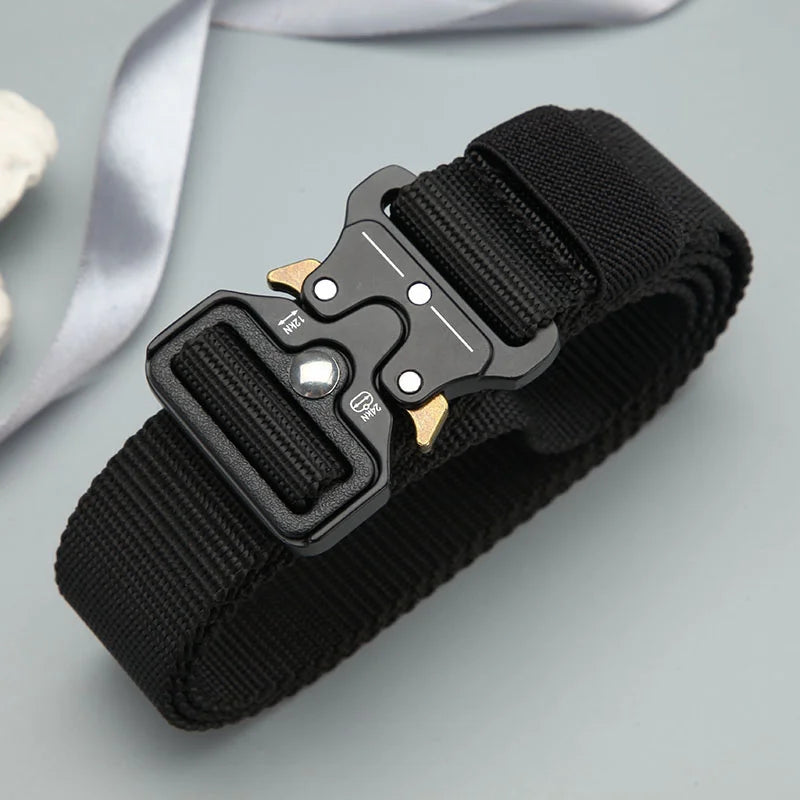 Black tactical nylon belt with a secure metal buckle and a gray ribbon in the background.