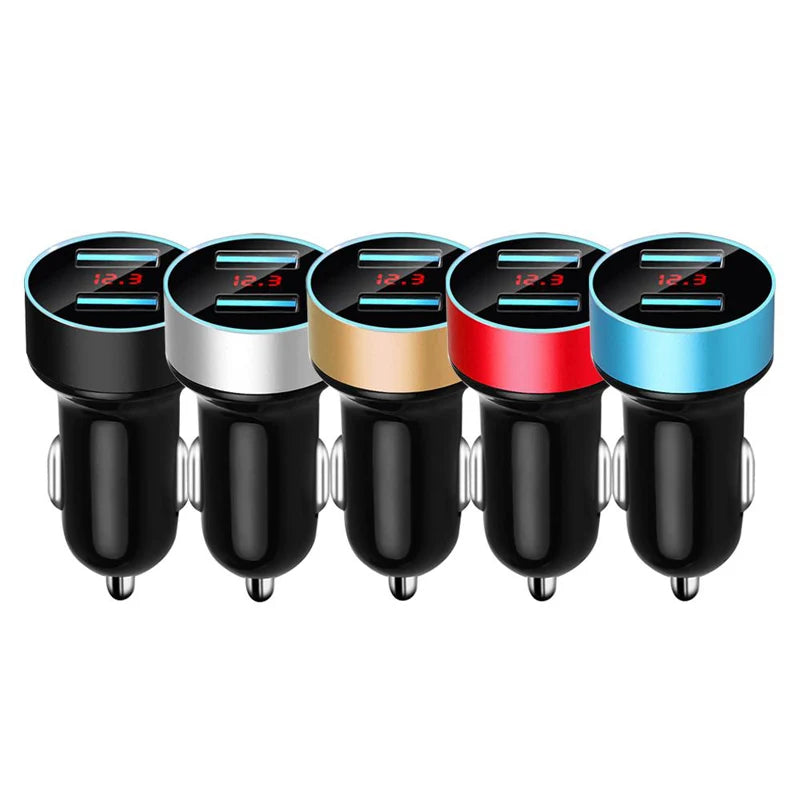 A set of four black and silver dual USB fast car chargers with LED indicators