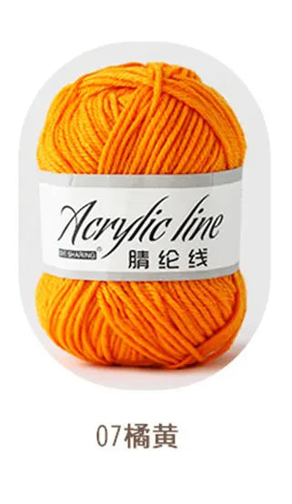 A ball of bright orange acrylic yarn labeled as Acrylic line 07 橘黃.