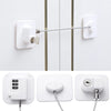 A white child safety cabinet lock mechanism with a key or digital code entry system.