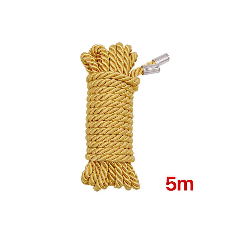 A bundle of golden yellow soft silk bondage rope, 5 meters long, with a metal clip attached.