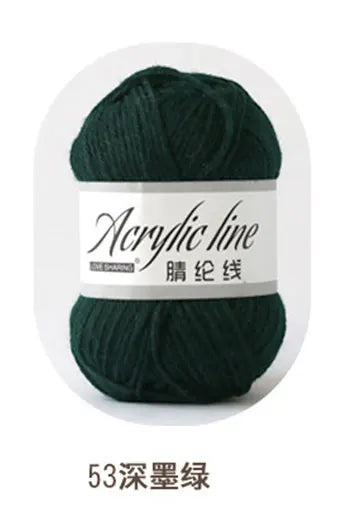 A ball of dark green acrylic yarn labeled as Acrylic line or 53 deep green thread.