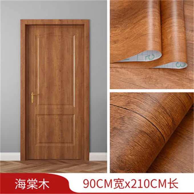 A vertical wooden door featuring a natural wood grain finish, shown alongside rolls of matching wood veneer.