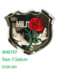 Embroidered US Marine Corps Medal patch featuring a red rose and white wings on a dark olive background